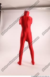 JOEL_ADAMSON CHRISTMAS VILLAIN WITH TWO GUNS